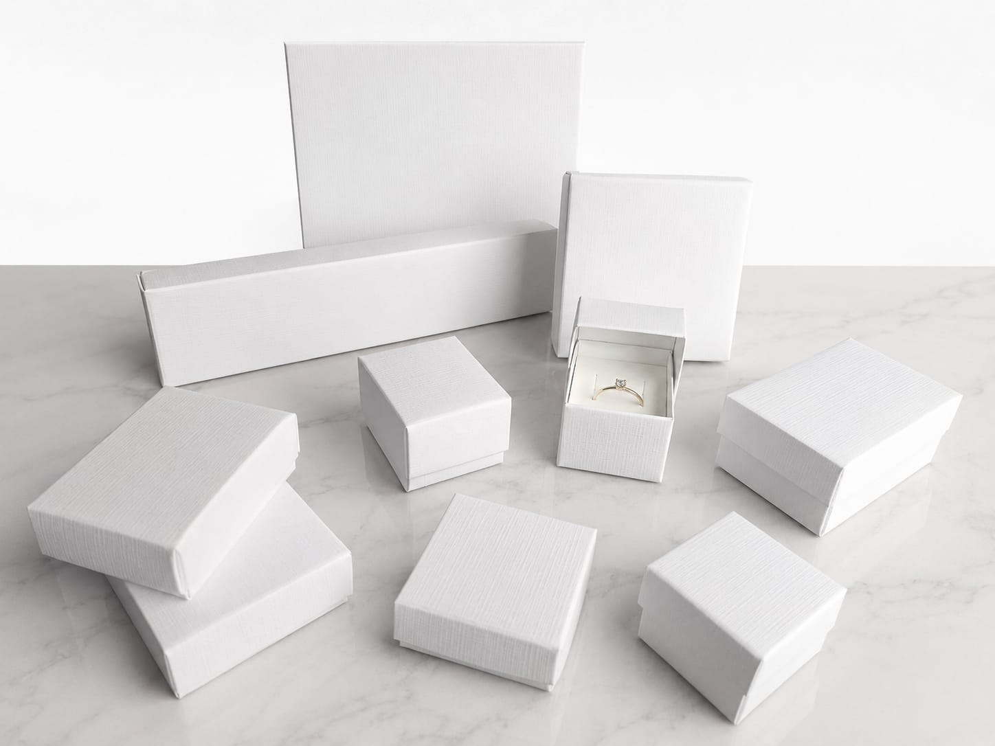 Estuches blancos texturados para joyería y bijouterie